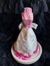 Paper dress in a dome