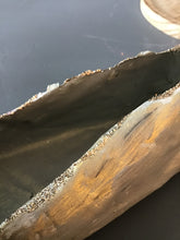 Paper shoe in glass dome