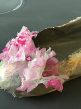 Paper shoe in glass dome